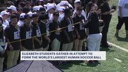 Elizabeth students attempt world record for largest human soccer ball News Clip
