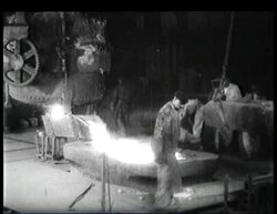 Factory work, metal forging, stone mining in Germany, early C20th Stock Footage