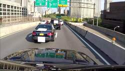 Uber drivers cross Brooklyn Bridge to protest IPO News Clip
