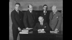 Official speaking to camera at National Railway Labor Conference in US during Great Depression News Clip