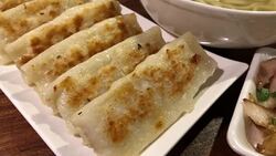 Motion of fried dumpling and appetizers on table inside Chinese restaurant Stock Footage
