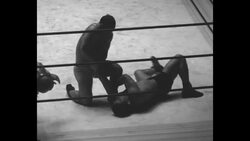 Abe Coleman's flying double kick technique fails to win professional wrestling bout against Jim Londos News Clip