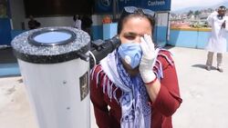 CLEAN : Hindu worshippers take a holy dip as skywatchers gaze solar eclipse in Nepal News Clip