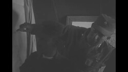 During Korean War, US officer and South Korean officers looking at map on wall during Battle of Bloody Ridge in North Korea News Clip