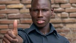 attractive black american young man making thumb up Stock Footage
