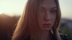 Beautiful girl posing in the sunlight. Sadness Stock Footage