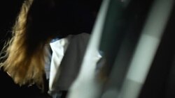 Criminal kidnapping young woman and putting her down in car trunk, crime Stock Footage