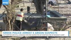 Greek Police Arrest 5 Suspected Arsonists In Refugee Camp Fire News Clip