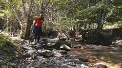 Young woman hiking. Stock Footage