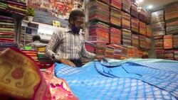 CLEAN : Indian sari weavers toil to keep tradition alive News Clip