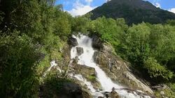 View waterfall scenes in mountains, national park Dombai, Caucasus, Russia Stock Footage