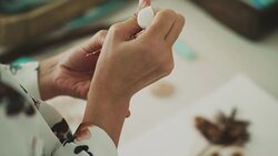 Artist hand making flower paper craft gift Stock Footage