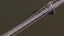 Few people walking on the Millennium Bridge during the Covid19 outbreak News Clip