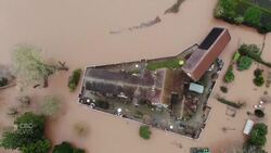 Flooding was a major risk to his home, so he built a wall News Clip