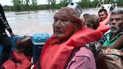 VOICED : Más de 12.000 personas evacuadas por lluvias que desbordaron ríos en Honduras News Clip
