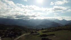 Aerial view of pyrenean mountains with shining sun,  France Stock Footage