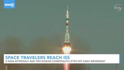 American, Russian Space Travelers Reach International Space Station News Clip