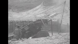During Korean War, US Marines in South Korea fire artillery pieces and rockets at Communist positions News Clip
