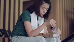 Asian woman exercising in a gymnasium Stock Footage