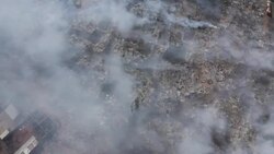 CLEAN : Aerial view of displaced people camp in Mali ravaged by fire News Clip