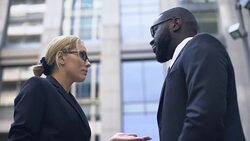 Female boss scolding subordinate, employee justifying himself, business ethics Stock Footage