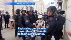 Austrian police detain dozens who disrupted far-right march in Vienna Instructional Video