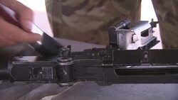 British soldiers cleaning machine guns at Camp Bastion News Clip