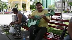 Santa Clara, Cuba: Popular Character Known as 'El Muneco' Stock Footage