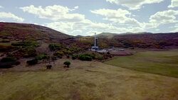 Aerial View of a Fracking Drilling Rig in the Autumn Mountains of Colorado Stock Footage