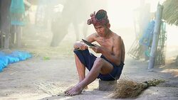 Portrait of the Asian old man doing his job and looking at the camera. Stock Footage