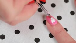How to Create a Skull and Crossbones Nail Art Design Instructional Video