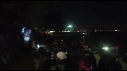 CLEAN : Indonesian croc freed after five years trapped in tyre News Clip