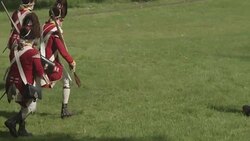 British Revolutionary war soldiers running with bayonets Stock Footage
