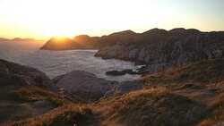 Amazing view of sunset over the rocks and the North sea on the most southern point of Norway Stock Footage