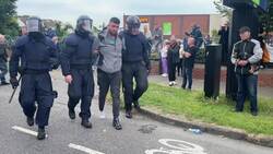 Garda move in as people protest migrant housing in Coolock, Ireland News Clip