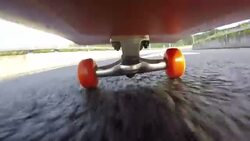 Under skateboard  POV - People skating on a highway road. Stock Footage