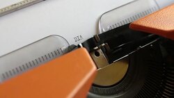Close up footage of a person writing DIABETES on an old typewriter Stock Footage