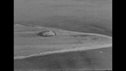 Helicopter surveys damage after the first hydrogen bomb blast News Clip