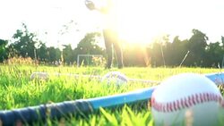 Baseball Game from Grass - Batter Hits Pitch Stock Footage
