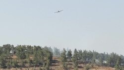 CLEAN : Firefighting plane extinguishing fire raging near Jerusalem News Clip