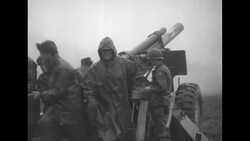 Loading artillery gun; unloading artillery shells News Clip