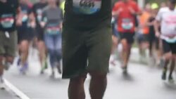 Amateur runners in marathon Stock Footage