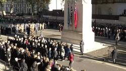 Protesters chant 'England, England, England' as wreaths are laid at the Cenotaph on Armistice Day News Clip