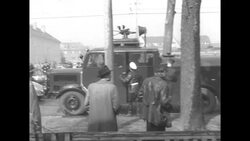 Lower house of West German Parliament meeting in Bonn approves European Defense Community Treaty, communist demonstrators in street News Clip