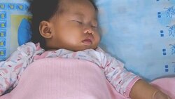 Cute Little Baby Daughter is Sleeping Stock Footage
