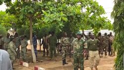 CLEAN : Malian soldiers and journalists gather in Kati camp ahead of press conference by rebel military leaders News Clip