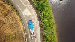 Aerial view of swamps and road in the Philippines, truck passing by  4K resolution video Stock Footage