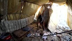 CLEAN : Destruction after deadly strike hits Idlib camp in Syria News Clip
