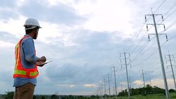 Engineer workers, Evaluation electrical energy Stock Footage