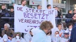 Climate protesters block Frankfurt car show Instructional Video